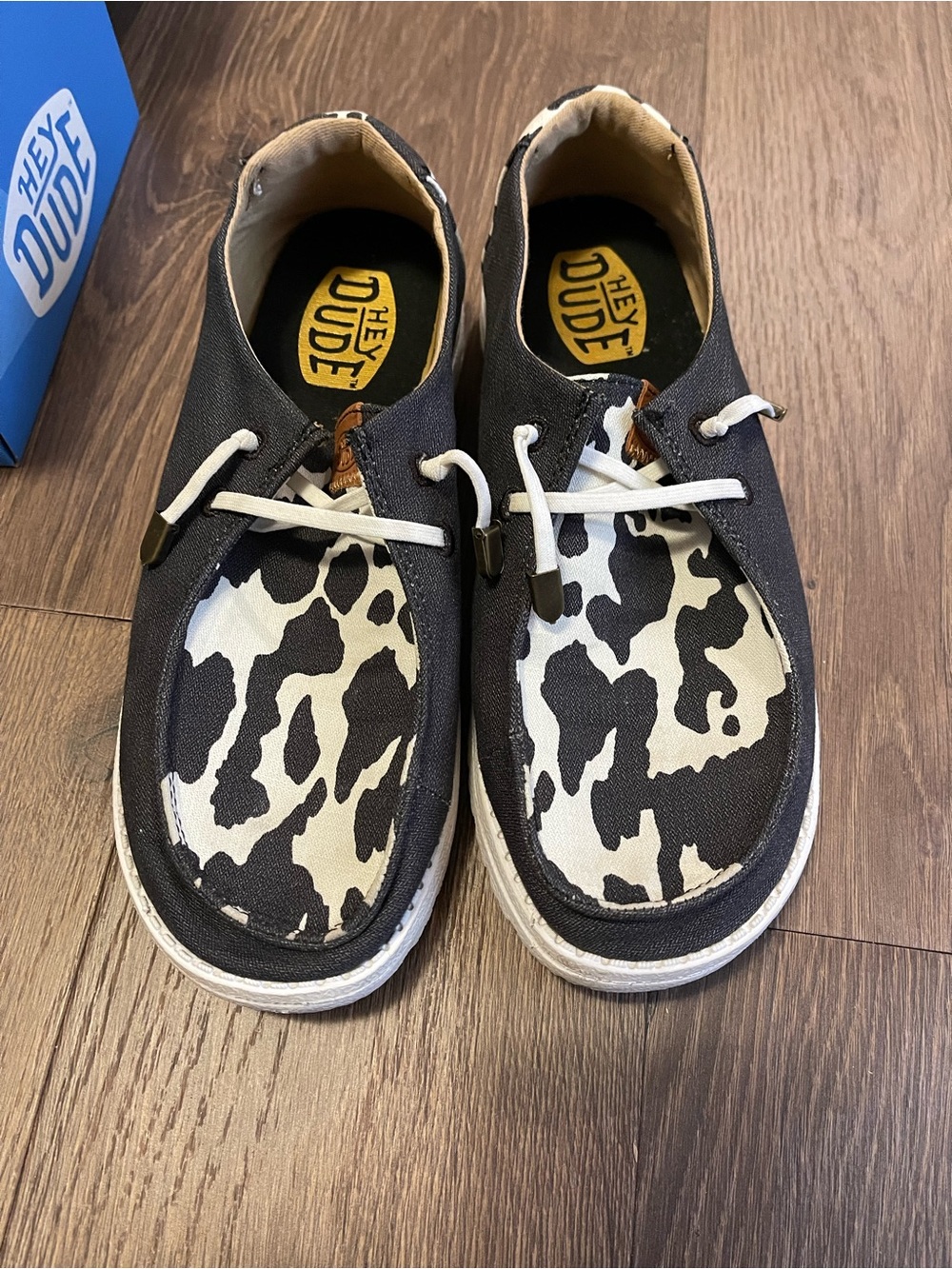 Hey Dude Women's Black and White Cow Print Wally